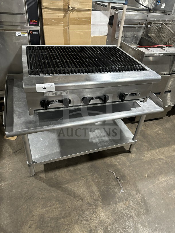 Radiance 36" stainless steel gas charbroiler with cast iron grates, individual controls, on legs and stand.