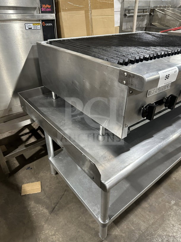 Radiance 36" stainless steel gas char broiler with cast iron grates. Features individual controls, on legs and stand.