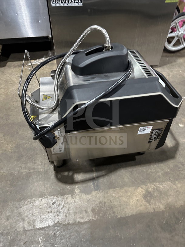 Electrolux stainless steel countertop electric infrared flat press, model HSPP2RPRS, 208V, digital controls, on legs.