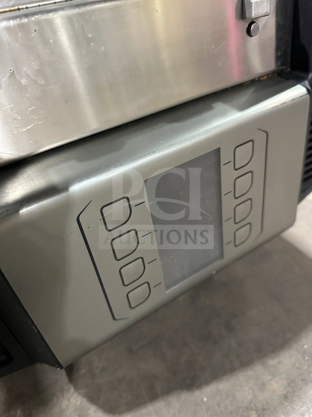 Electrolux stainless steel flat press with digital controls, model HSPP2RPRS, in good condition.