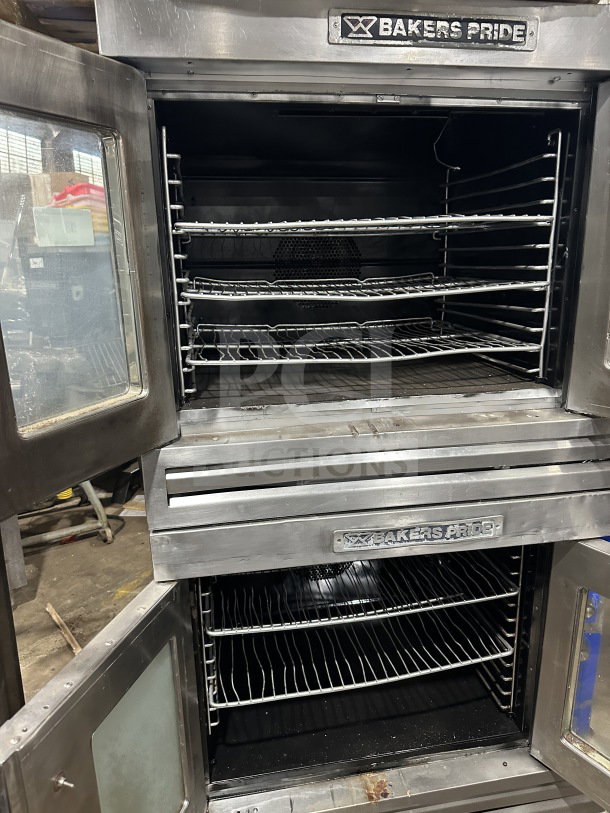 Bakers Pride Cyclone Series double-stacked stainless steel convection oven, model CO11G1, gas powered, with racks, on casters.