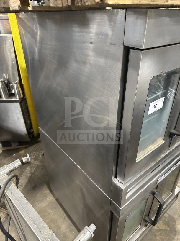 Bakers Pride Cyclone Series stainless steel double-stacked convection oven, model CO11G1, gas-powered, wired rack, on casters.