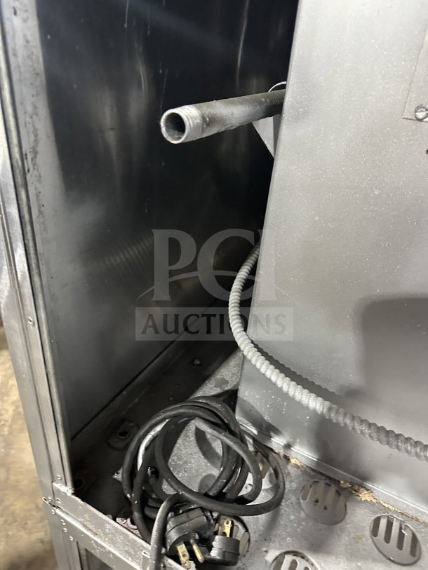 Bakers Pride Cyclone Series commercial stainless steel gas convection oven CO11-G1, with wiring and casters, model 24286.