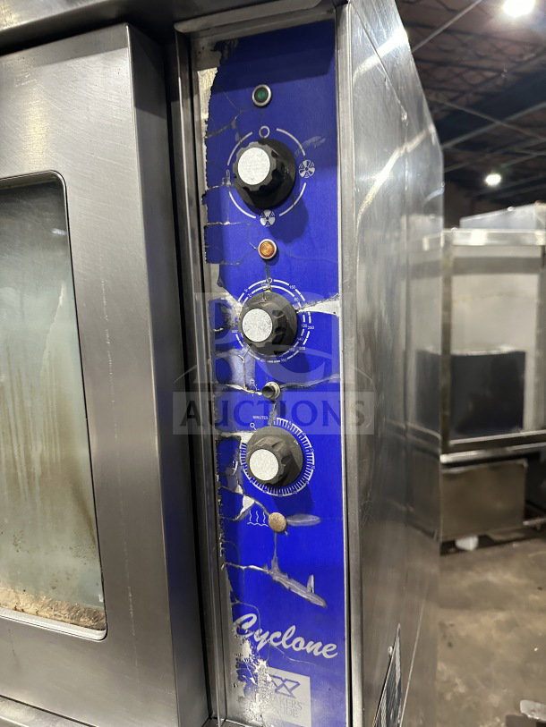Bakers Pride Cyclone Series stainless steel double stacked convection oven, Model CO11-G1, gas powered, with control panel and wired rack.