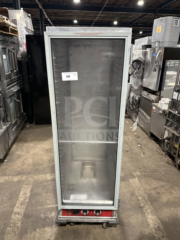 Avantco stainless steel heated holding/proofing cabinet, model 177HPU1836, with glass door, pan slides, on casters.