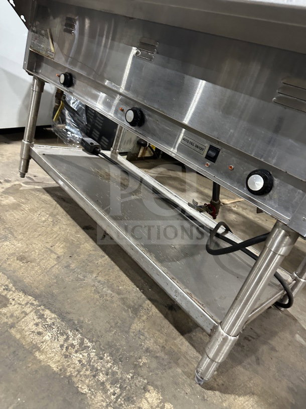 Eagle Group commercial stainless steel underbar cocktail/ice bin on legs, with control knobs and shelf, good condition.