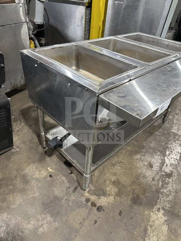 Eagle Group stainless steel underbar cocktail/ice bin with legs, featuring two compartments, commercial-grade condition.