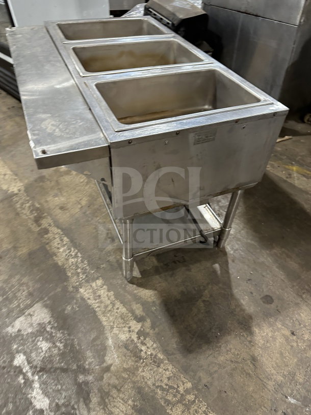 Eagle Group stainless steel underbar cocktail/ice bin, with three compartments and legs, in used condition.