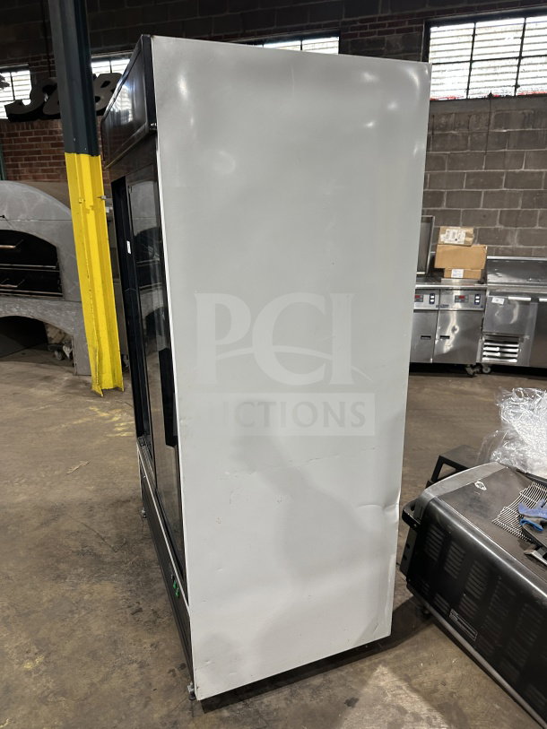 Maxx Cold Commercial black double glass swing door reach-in merchandiser freezer, Model MXM2-48S. Side view.