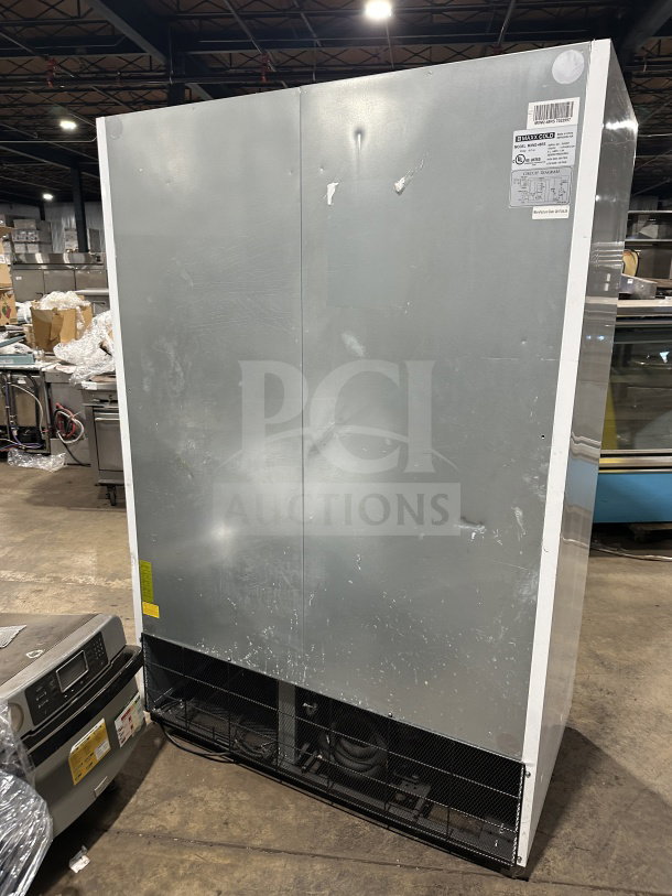 Maxx Cold black double glass door freezer, model MXM2-48S, SN 5070164, with poly coated wire rack. 115/230V, 1 Phase. Visible wear.