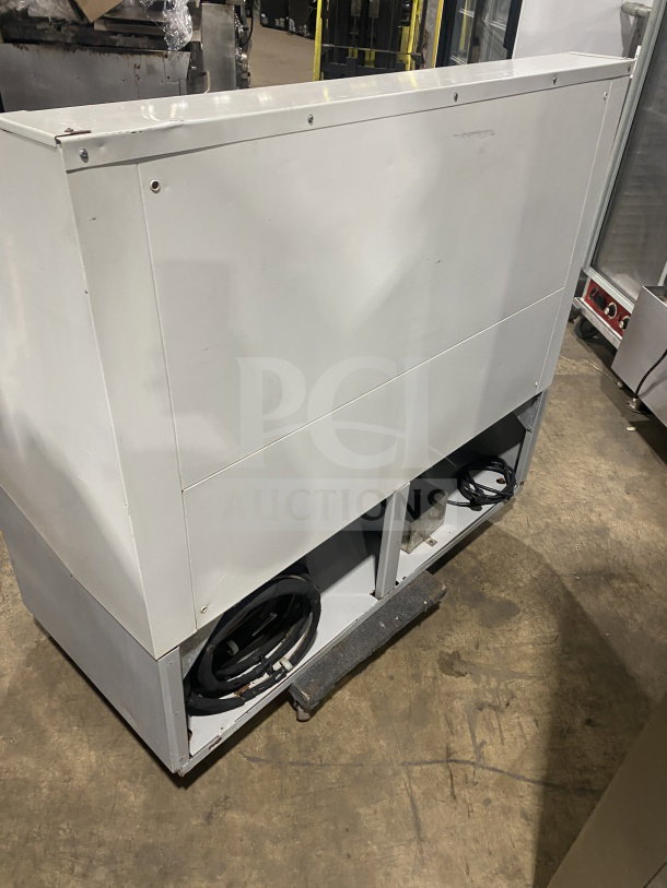 Hussmann SHM-4 48" white electric open-air merchandiser, 115V, 1 phase, SN 04J05956-788, in used condition.