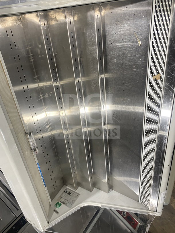 Hussmann SHM-4 48" white electric open air merchandiser, model SHM-4, serial 04J05956-788, 115V, in used condition.