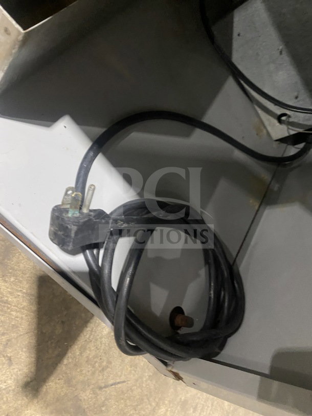 Hussmann SHM-4 commercial open air merchandiser power cord. Black, coiled, in good condition. 115V, 1 Phase.