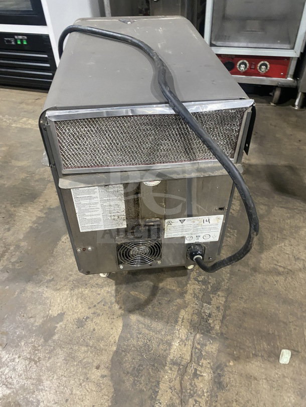 TurboChef NGO commercial rapid cook oven, electric, 208/240V, 1Phase, digital controls, on legs, showing power cord and vent.