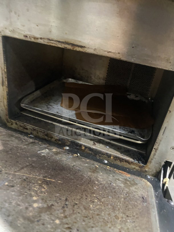 TurboChef commercial electric countertop rapid cook oven, Model NGO, with digital controls. Used condition, visible wear inside.