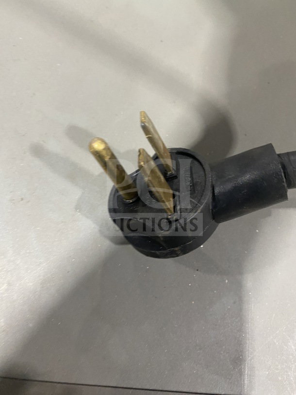 Three-prong power plug of a TurboChef NGO model commercial rapid cook oven. Suitable for 208/240V 1Phase power.