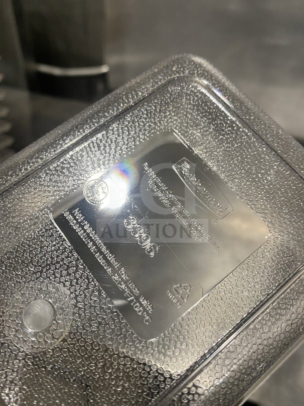 Rubbermaid 4" commercial polypropylene transparent food pan, model 339600. Features embossed label and textured surface.