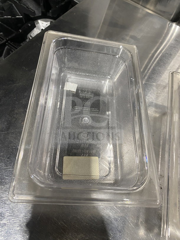 Rubbermaid Commercial polypropylene fourth-size transparent food pan, Model 339600, excellent condition, visible label inside.