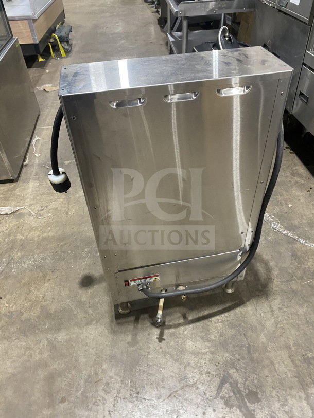 Fetco CBS-2142-XST Commercial Stainless Steel Twin Coffee Brewer, electric-powered, on legs, back view, used condition.