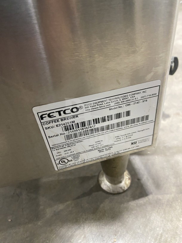 Fetco CBS2142XST stainless steel twin coffee brewer, electric, 200/240V, 1 phase, countertop, on legs. Model tag shown.