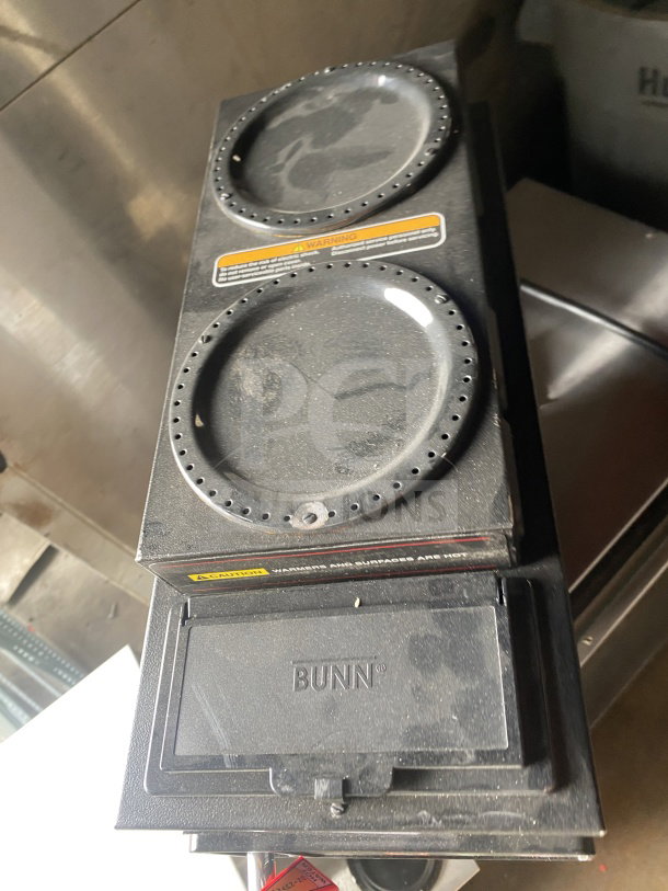 Bunn AXIOMP-35-3 stainless steel coffee brewer, 3 warming stations, 120V, 1 phase, commercial use, some surface wear.