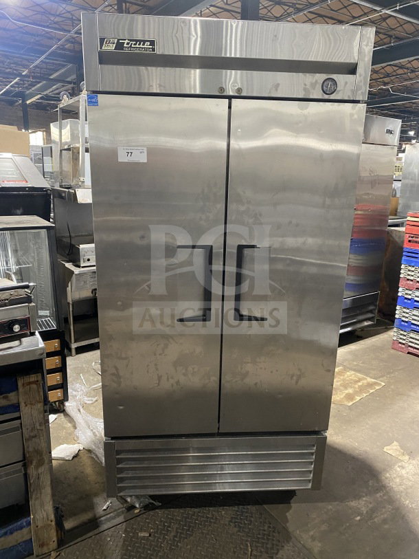 True T-35 commercial stainless steel 2-door refrigerator, electric, poly-coated rack, on casters, model and serial labels visible.