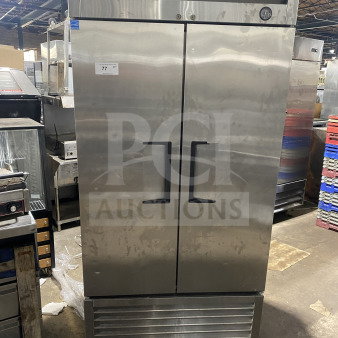 True T-35 commercial stainless steel 2-door refrigerator, electric, poly-coated rack, on casters, model and serial labels visible.
