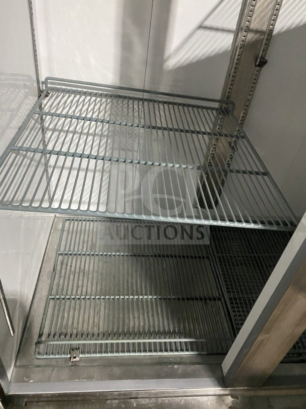 Avantco Commercial Stainless Steel 2 Door Electric Freezer with Poly Coated Wired Rack, Model 178A49RHC on Casters.
