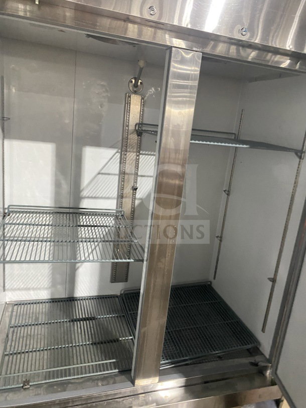 Avantco 178A49RHC commercial stainless steel 2-door reach-in freezer with poly-coated wire racks, on casters, 115V.