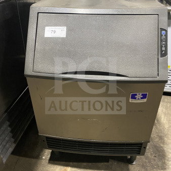 Manitowoc stainless steel undercounter ice maker, model UYF0140A-161B. Features air-cooling, electric-powered, 115V, 1 phase. Visible wear.