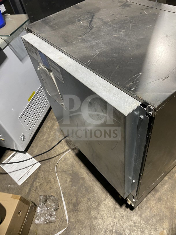 Manitowoc stainless steel ice maker, model UYF0140A161B, electric-powered, air-cooled, undercounter design, used condition.