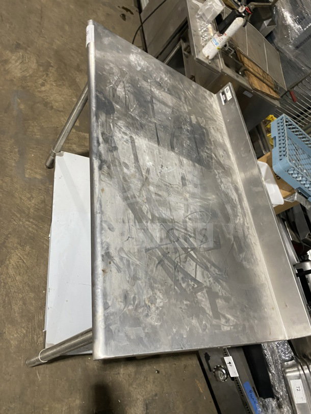 Sauber Select PA7348 stainless steel worktop table with backsplash, single shelf, sturdy legs, commercial-grade, used condition.
