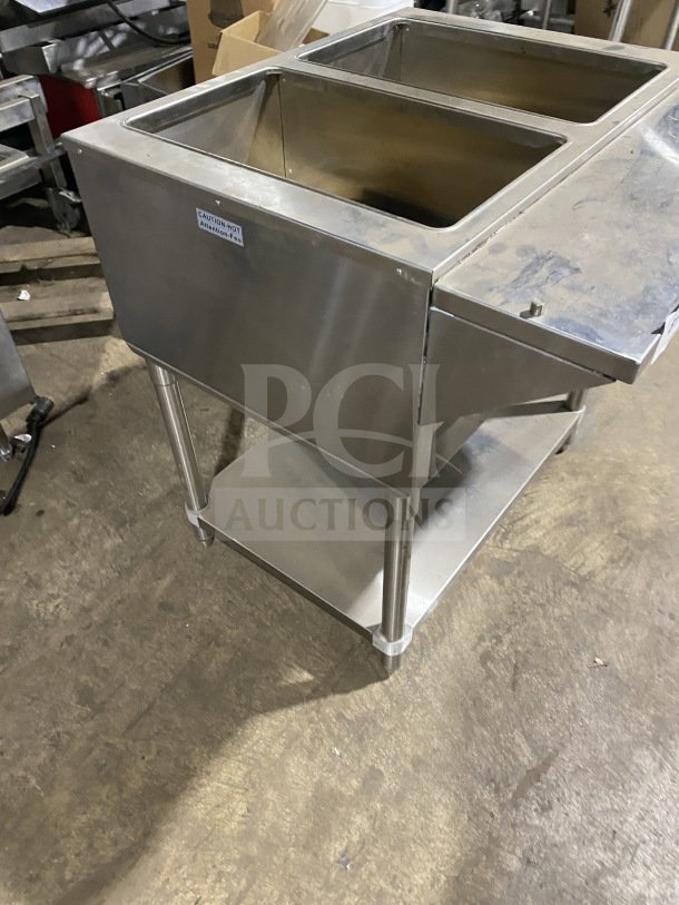 Prepline Commercial stainless steel two-well gas-powered steam table with sneeze guard, undershelf, on legs.