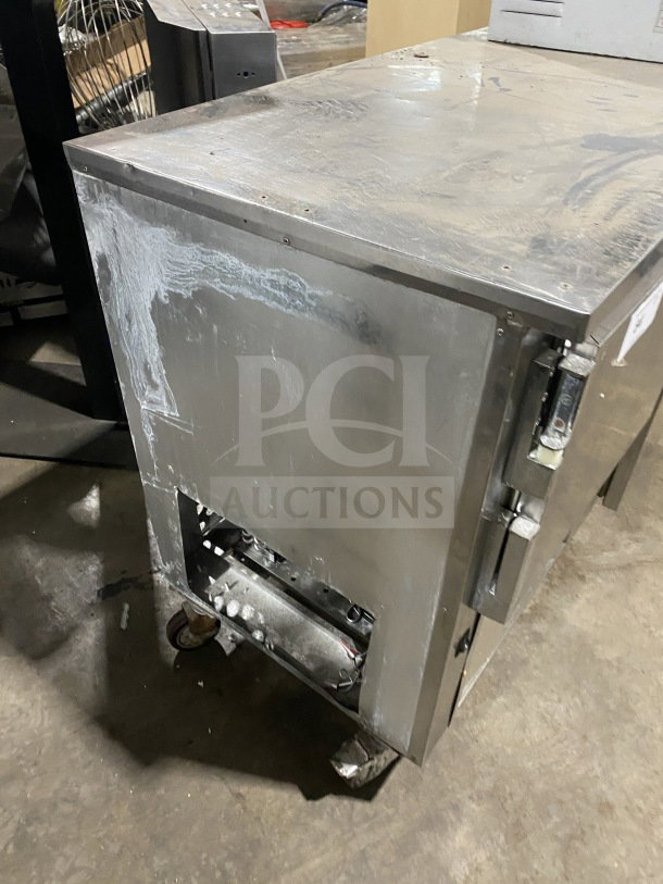 Leader LB48SC 2-door stainless steel lowboy refrigerator on casters. Includes chrome wire rack. Used condition, 115V, 1 Phase.