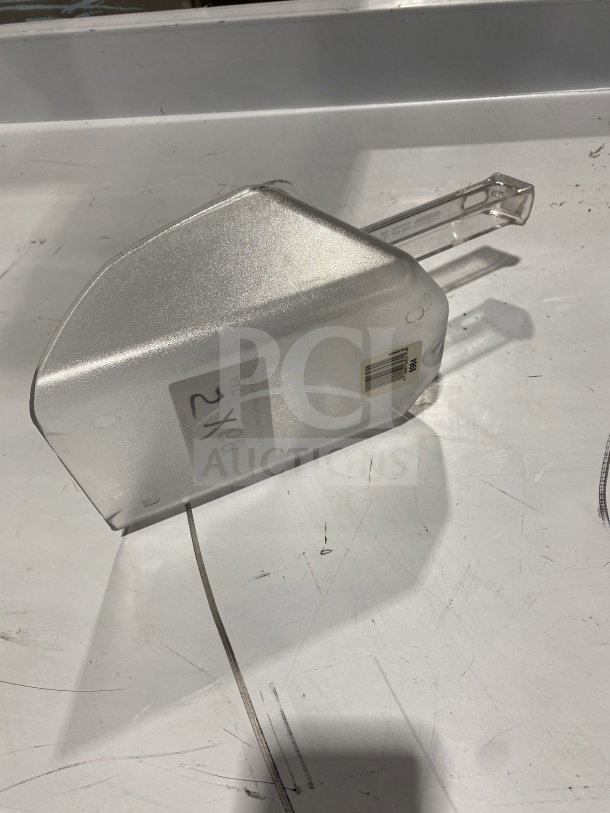 New Camwear 9964 clear polycarbonate food scoop, commercial grade, new condition, marked with "5X Your Bid" label.