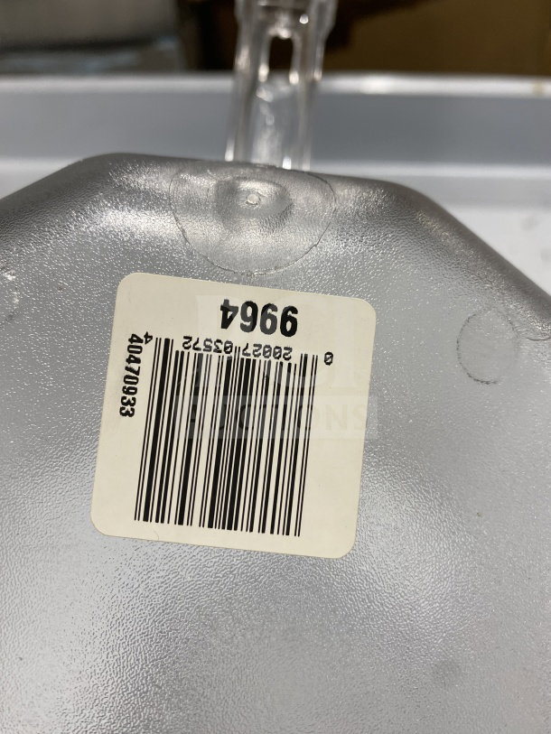 Clear Camwear commercial polycarbonate food scoop, model 9964. New condition with barcode label visible.