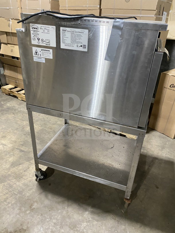 FWE Handy Line stainless steel 4-pan heated cabinet model HLC18264 on casters, with equipment stand, 120V, insulated, used condition.