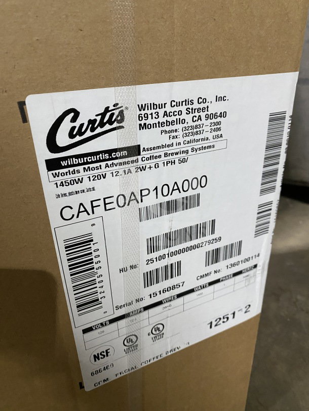 Brand new Curtis countertop coffee brewer, model CAFEOAP10A000, in box. 120V, 1450W, serial no. 15160857.