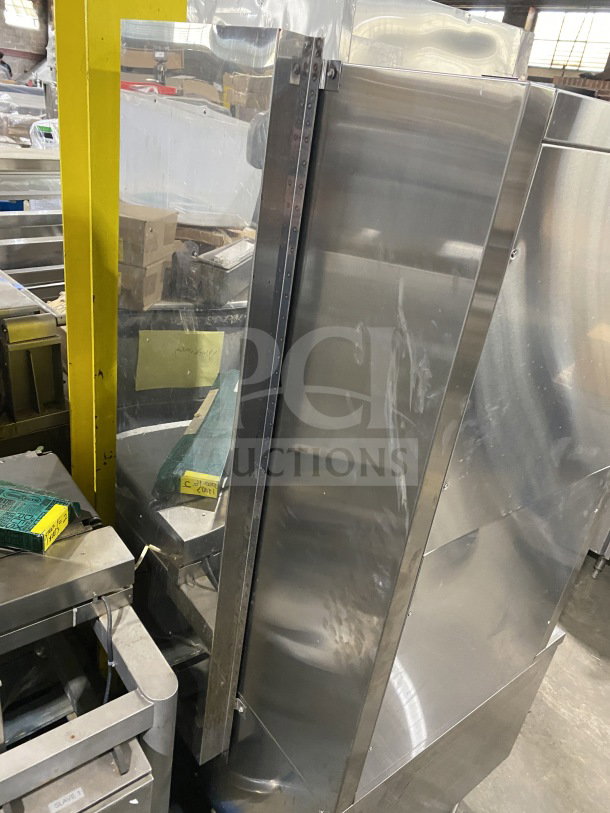 FlameMate ESC-3N-N stainless steel 3-compartment steam cabinet on legs, natural gas powered. Slight surface wear visible.