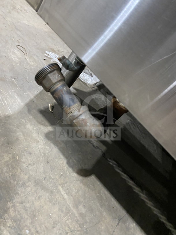 Flame-Mate ESC-3N-N steam cabinet pipe detail, showing connection and wear. Stainless steel construction visible.