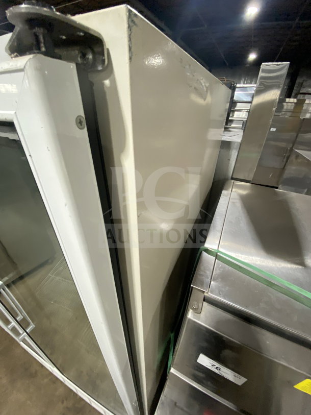 Master Bilt BLG48HD commercial glass 2-door freezer/refrigerator with poly-coated wire rack, minor wear visible, 115V, 1 Phase.