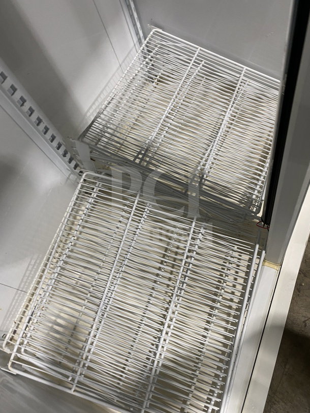 Master Bilt BLG48HD commercial freezer with glass doors, poly coated wired racks, model BLG48HD, 115V, 1 phase.