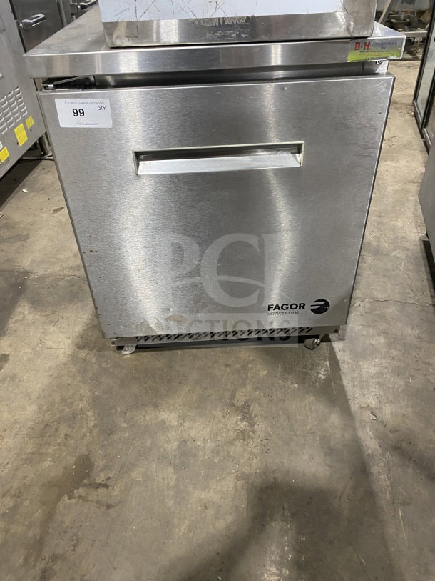 Fagor stainless steel undercounter refrigerator, model FUR-27, on casters, with poly-coated wire rack. Serial: 07070051M.
