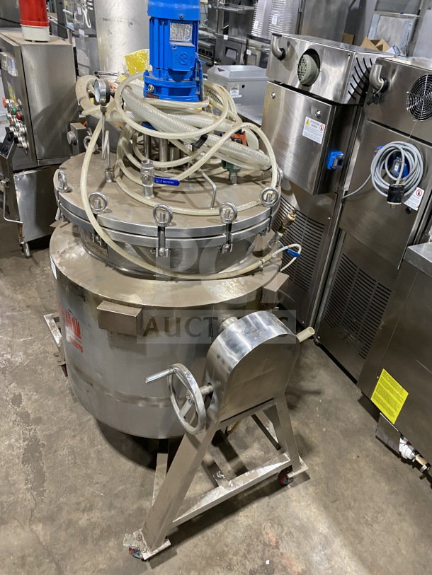 Jingye stainless steel high pressure cooker with Unifiller commercial depositor on casters, features control panel and hoses.