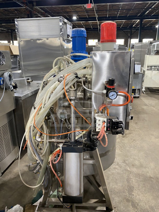 Jingye Commercial Stainless Steel Automatic High Pressure Cooker with Unifiller Depositor, features casters, industrial hoses, gauges.