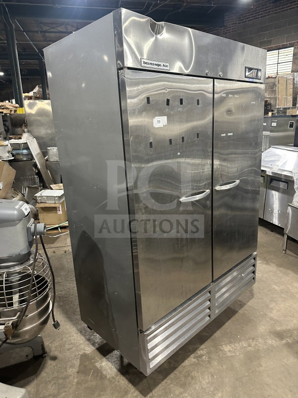 Beverage-Air KF48-1AS commercial stainless steel 2-door reach-in freezer with poly-coated wired rack, 115V, sturdy condition.