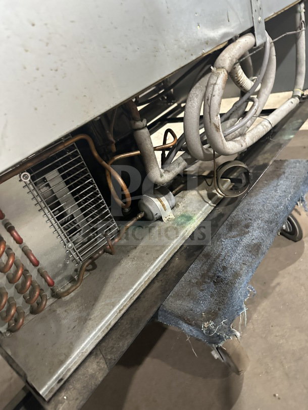 Beverage-Air commercial freezer, model KF48-1AS, showing internal components and wiring, fair condition.