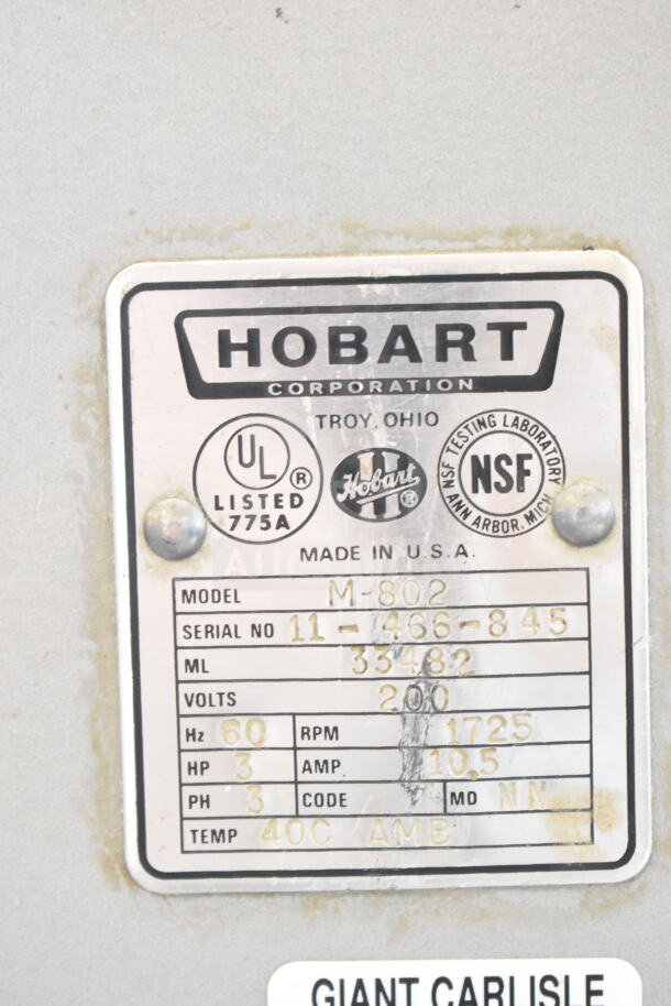 Hobart M802 commercial 80 qt planetary dough mixer with bowl, dolly, guard, and hook. 200V, 3 phase. Model label shown.