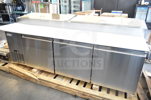 Brand new Avantco 178SSPPT3 commercial pizza prep table, stainless steel, 115V, scratch and dent condition.