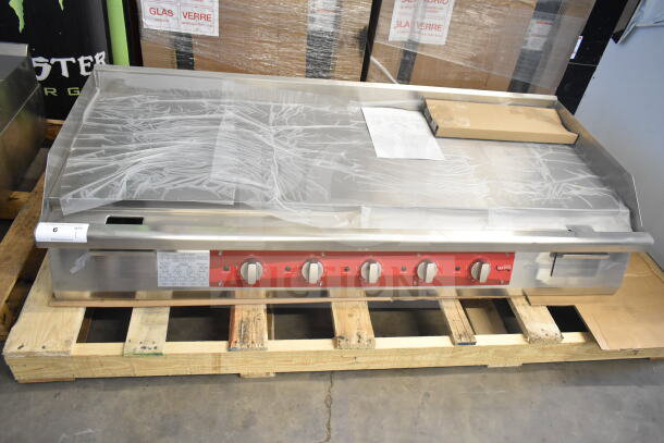 Brand new Avantco 177EG60C 60" electric countertop griddle, 208V, 3 phase, with minor scratches. Includes controls and labels.